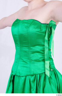  Photos Woman in Ceremonial 20th century Dress 20th century green dress upper body 0003.jpg